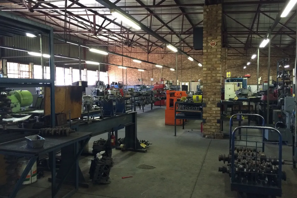 Alfissimo Auto Engineering machining workshop floor in Pretoria with crankshafts and engine blocks on the benches