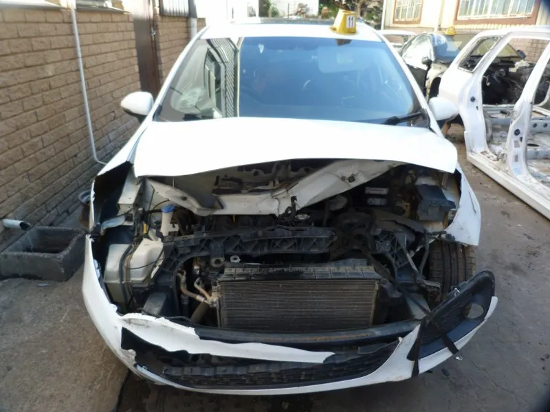 2013 Kia Rio G4FA view 2