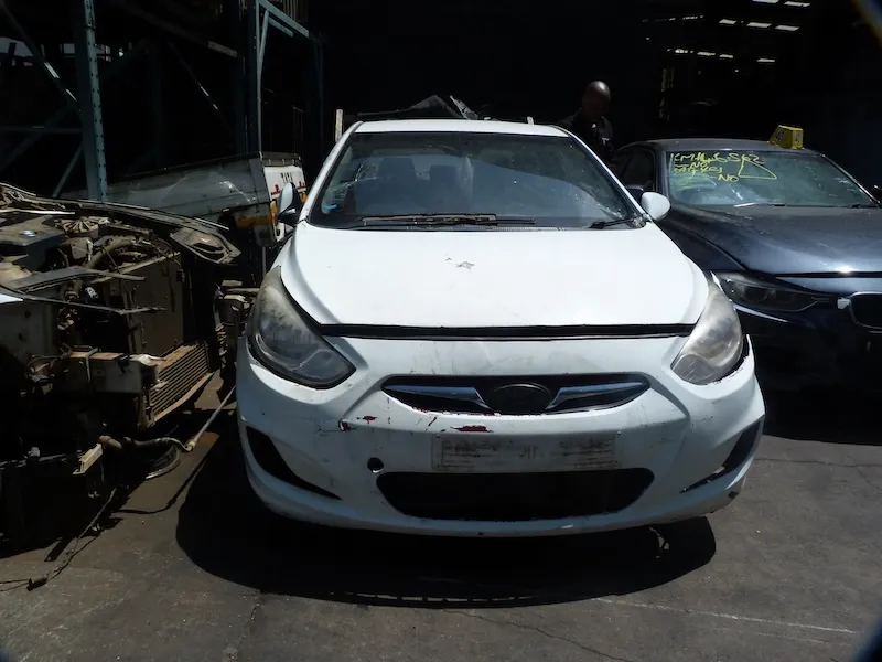 2012 Hyundai Accent G4FC view 2