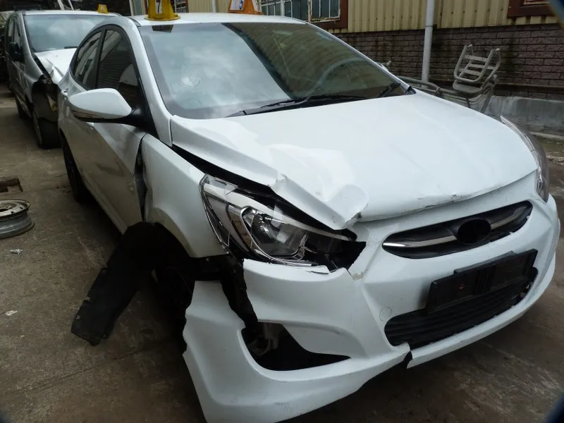 2015 Hyundai Accent G4FC view 2