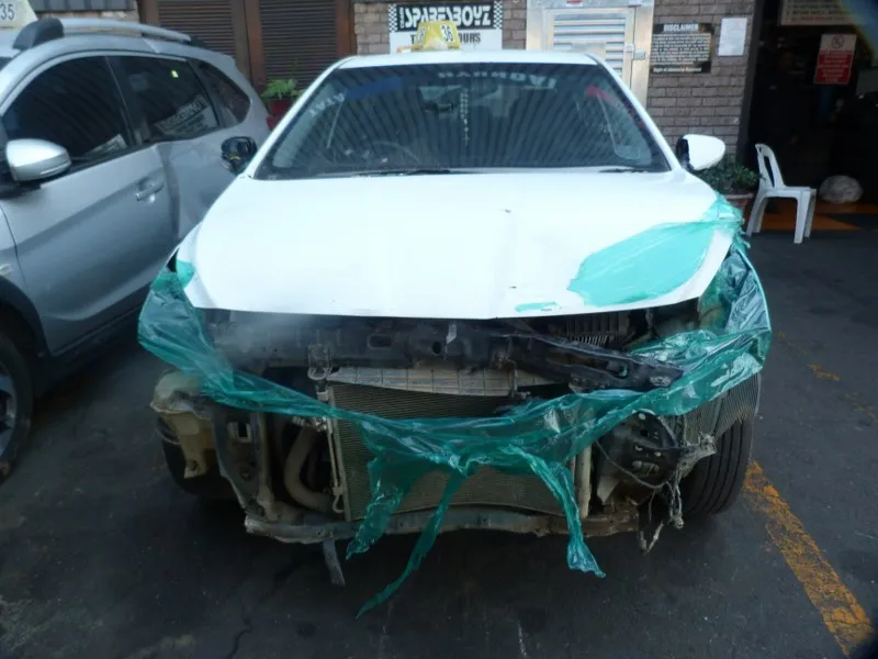 2012 Hyundai Accent G4FC view 2